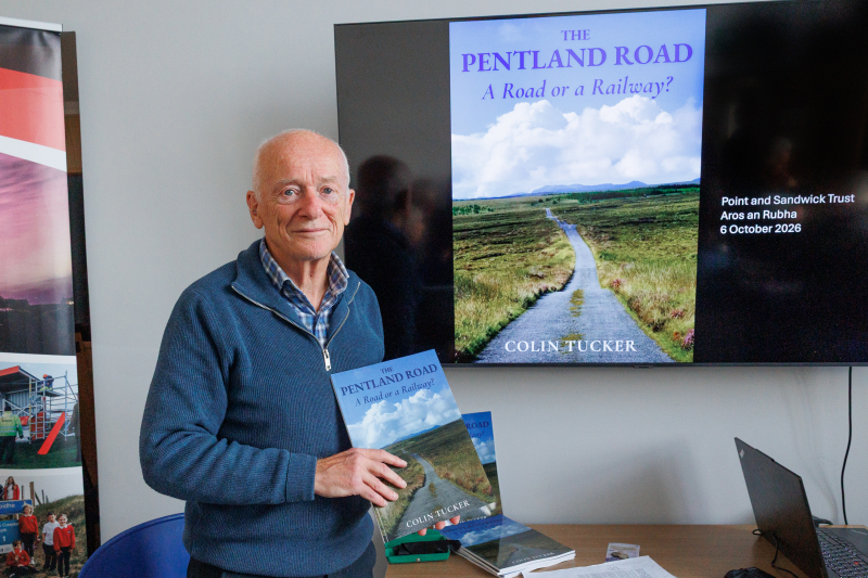 Colin Tucker with a copy of his book The Pentland Road. Picture by SandiePhotos